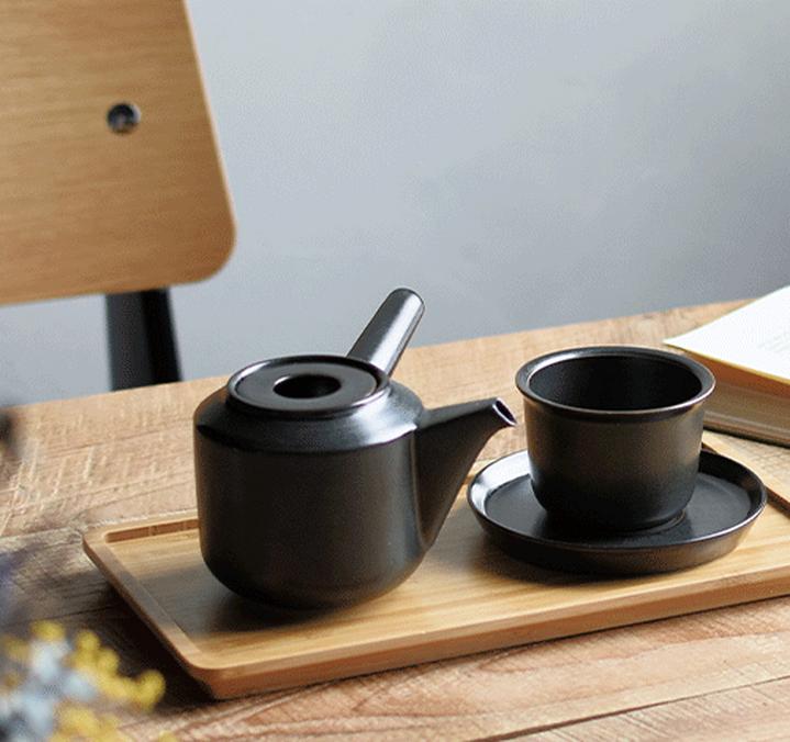 cup and saucer kinto leaves to tea